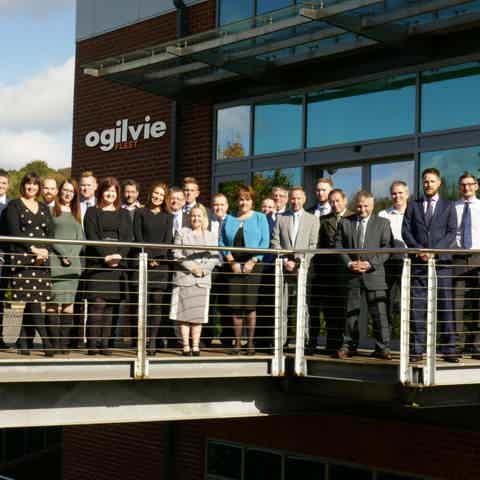 image of colleagues standing outside Ogilvie FLeet Sheffield