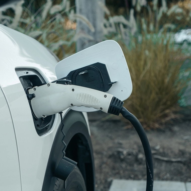 an electric vehicle plugged in to charge